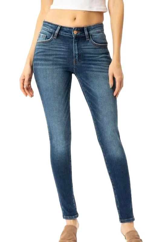 Women's Premier Mid Rise Super Skinny Jeans In Medium Stone Wash Stylish Shredded Denim Jeans